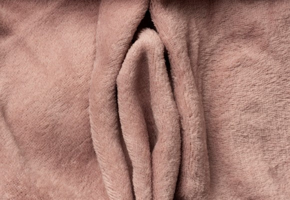 manta color rosado  com pliegues en forma de vulva